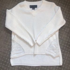 White sweater with side tears. New without tags